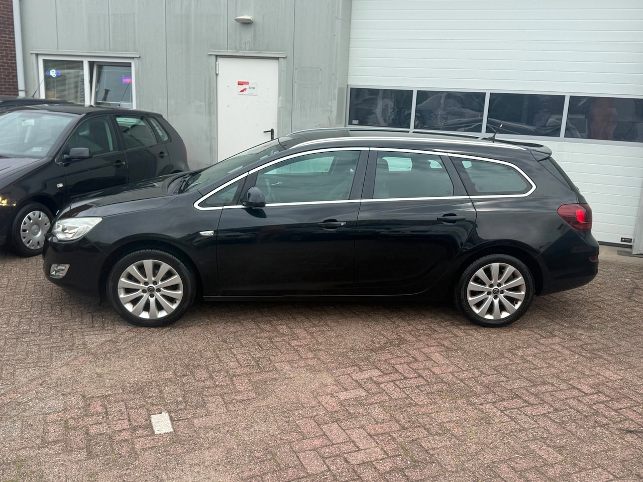 Opel Astra Sports Tourer - 1.4 Cosmo 1.4 Cosmo - AutoWereld.nl