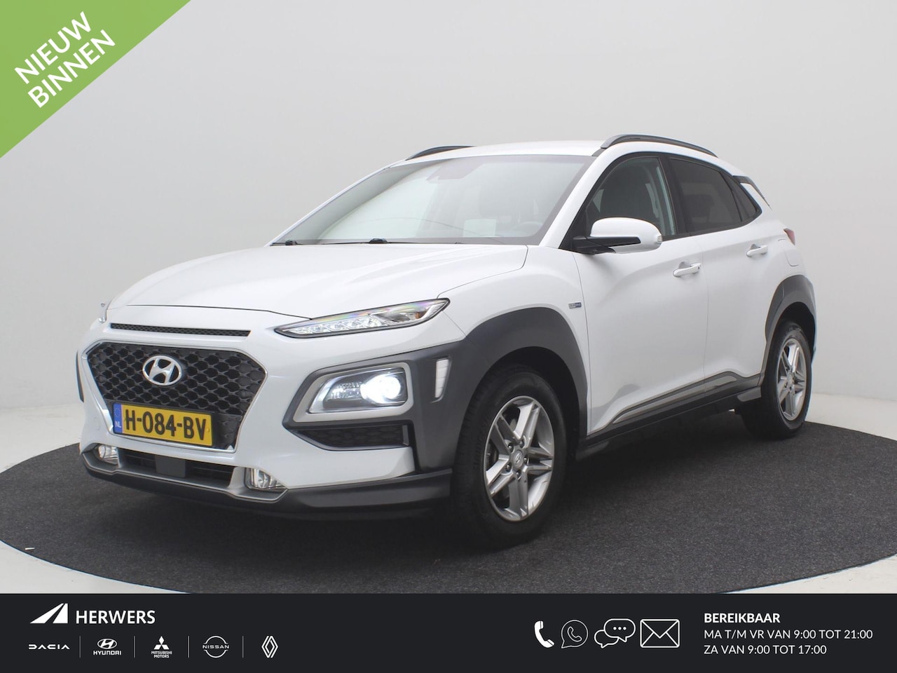 Hyundai Kona - 1.6 GDI HEV Premium / Trekhaak / Lederen bekleding / HUD Display / Navigatie / Adaptieve C - AutoWereld.nl