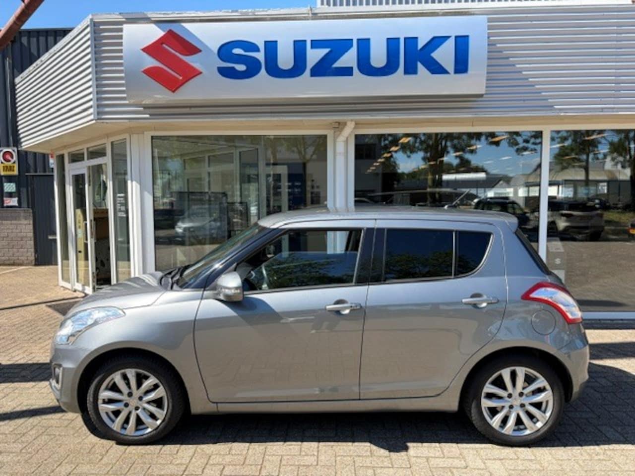 Suzuki Swift - 1.2 5D Exclusive (RIJKLAAR) - AutoWereld.nl
