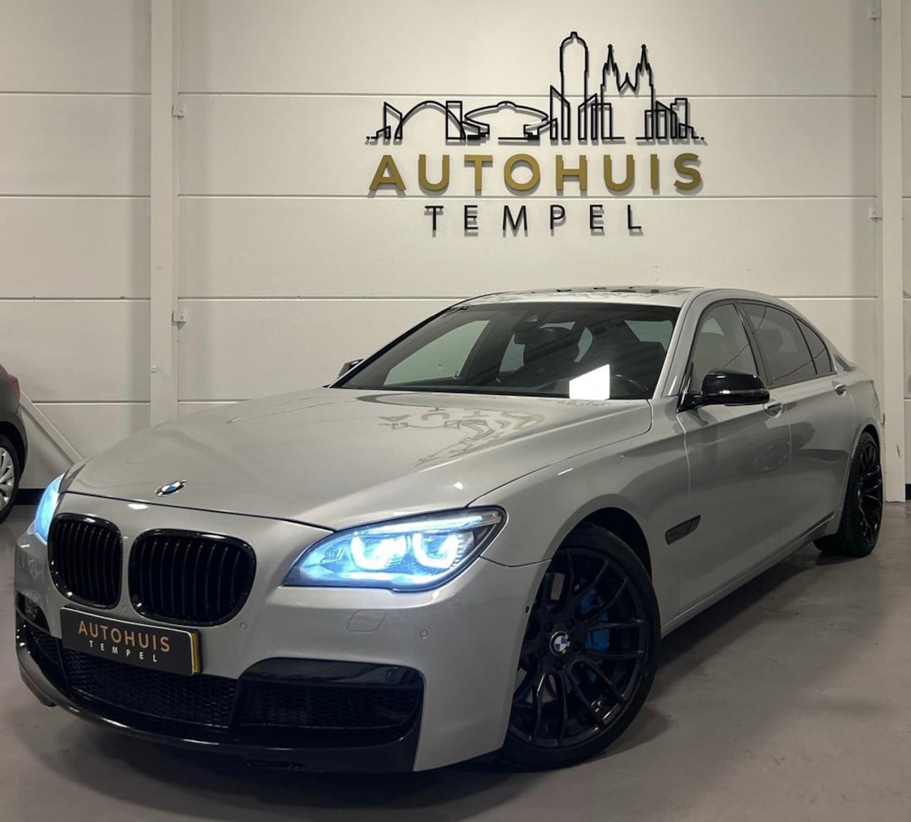 BMW 7-serie - 750Li M Pakket Pano Cruise Climate Softclose Memory Stuurverwarming VOL - AutoWereld.nl
