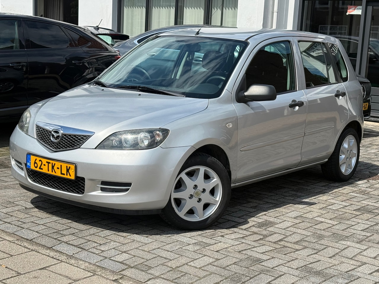Mazda 2 - 1.4 Touring 1.4 Touring, Trekhaak, Airco,Elektr.ramen,Stuurbekrachtiging,L.M.Velgen - AutoWereld.nl