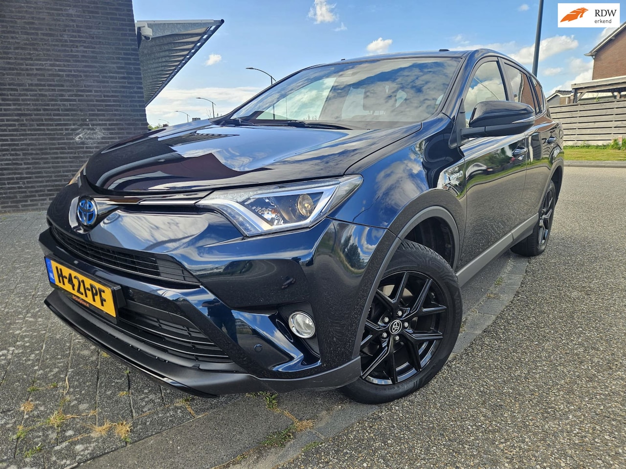 Toyota RAV4 - 2.5 Hybrid AWD Dynamic GARANTIE Parelmoer Kleur - AutoWereld.nl