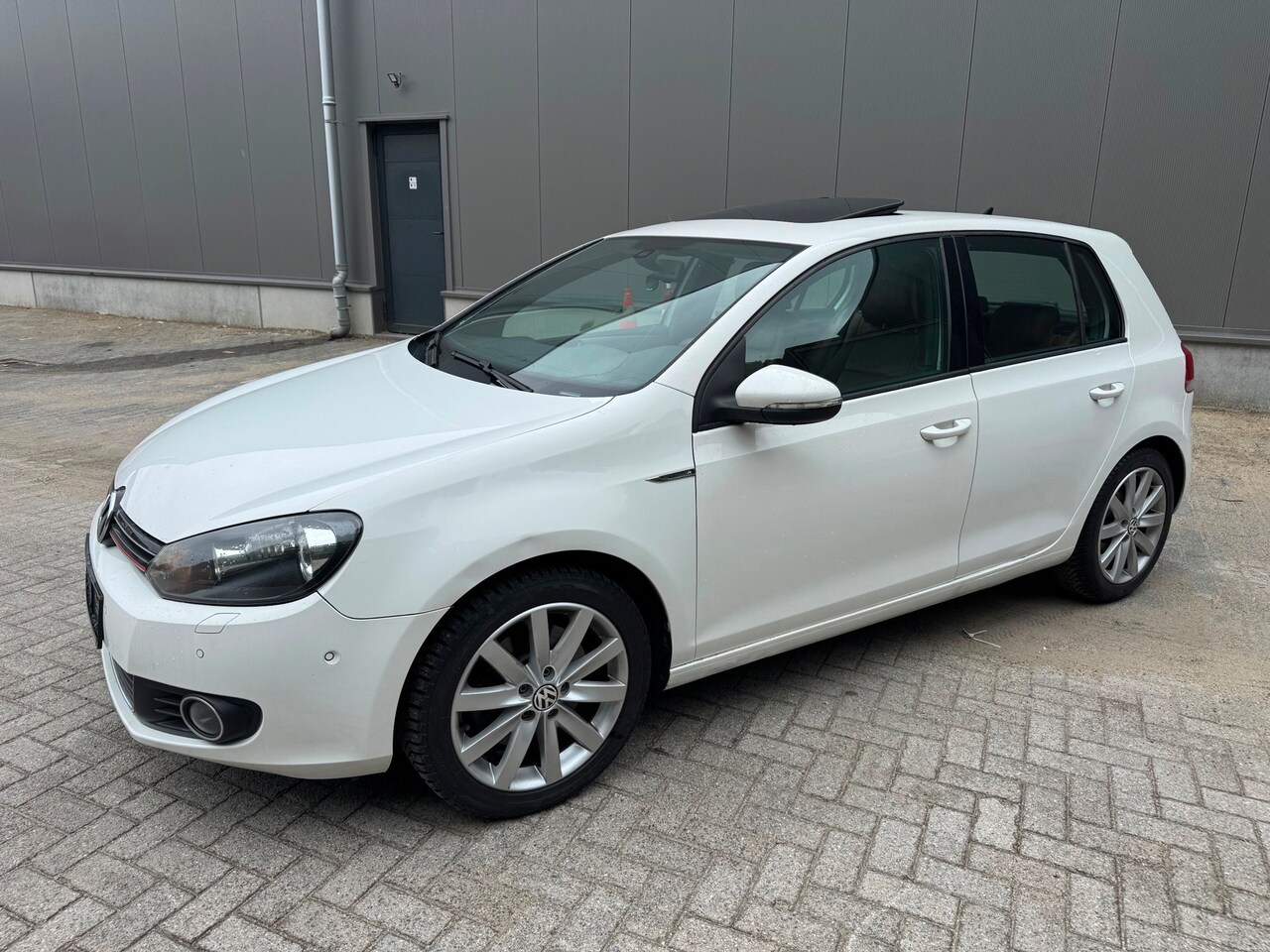 Volkswagen Golf - 1.4 TSI Highline Automaat Pano Leer - AutoWereld.nl