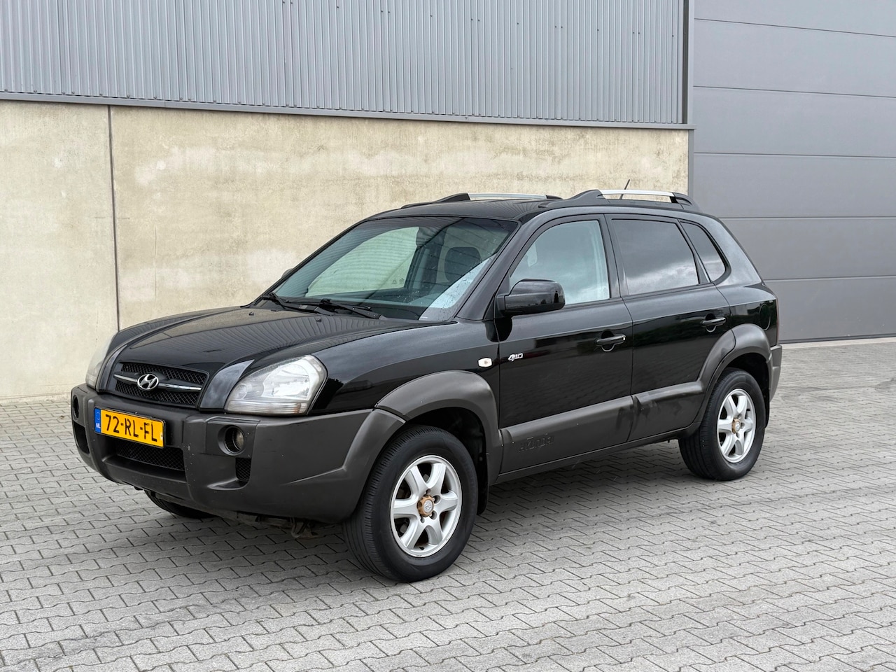 Hyundai Tucson - 2.7i V6 4WD Style NAP+AUTOMAAT+Climate+Cruise+Leder+ Stoelverwarming+Trekhaak+Lm velgen - AutoWereld.nl