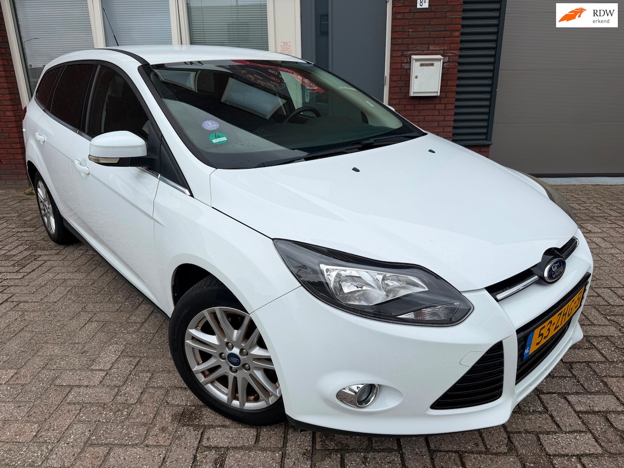 Ford Focus Wagon - 1.0 EcoBoost Titanium / Navi / PDC / Clima / Cruise / NAP - AutoWereld.nl