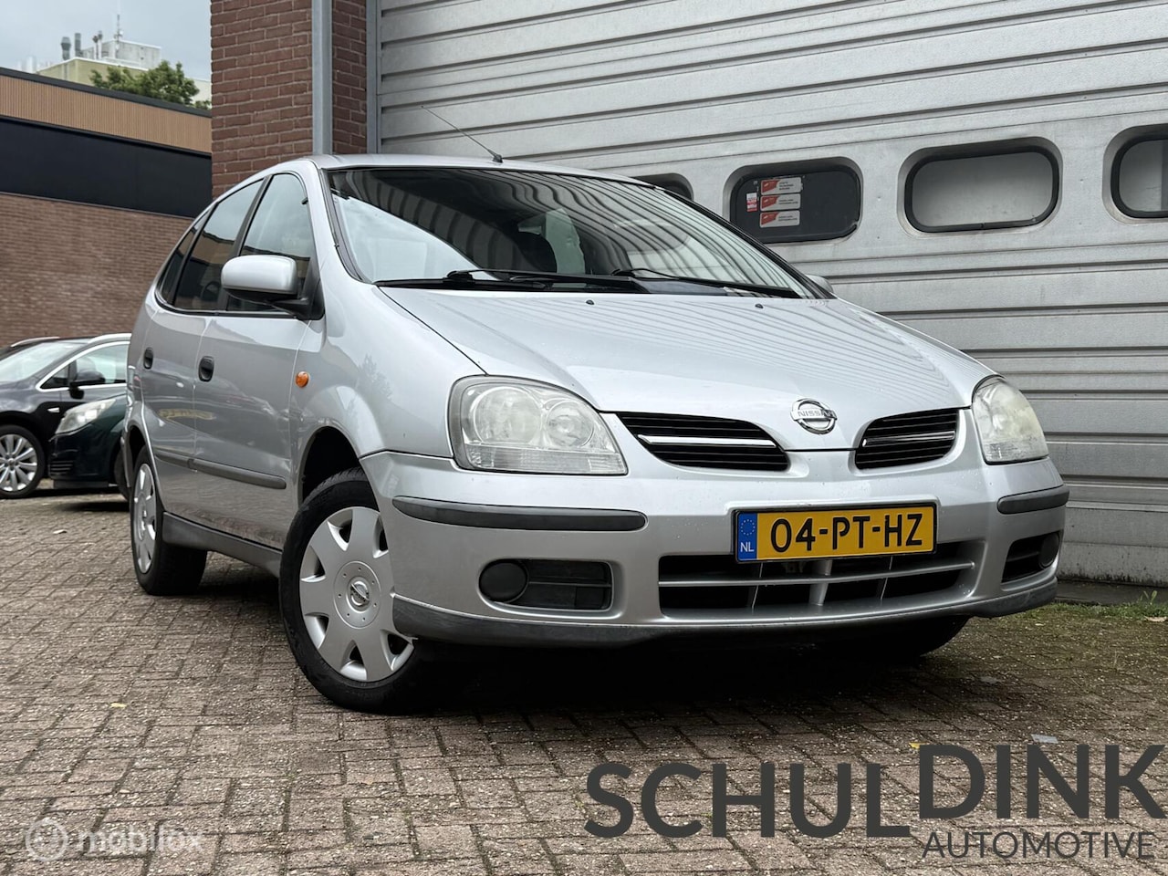 Nissan Almera Tino - 1.8 Visia TREKHAAK|CAMERA|HOGE INSTAP|AIRCO - AutoWereld.nl