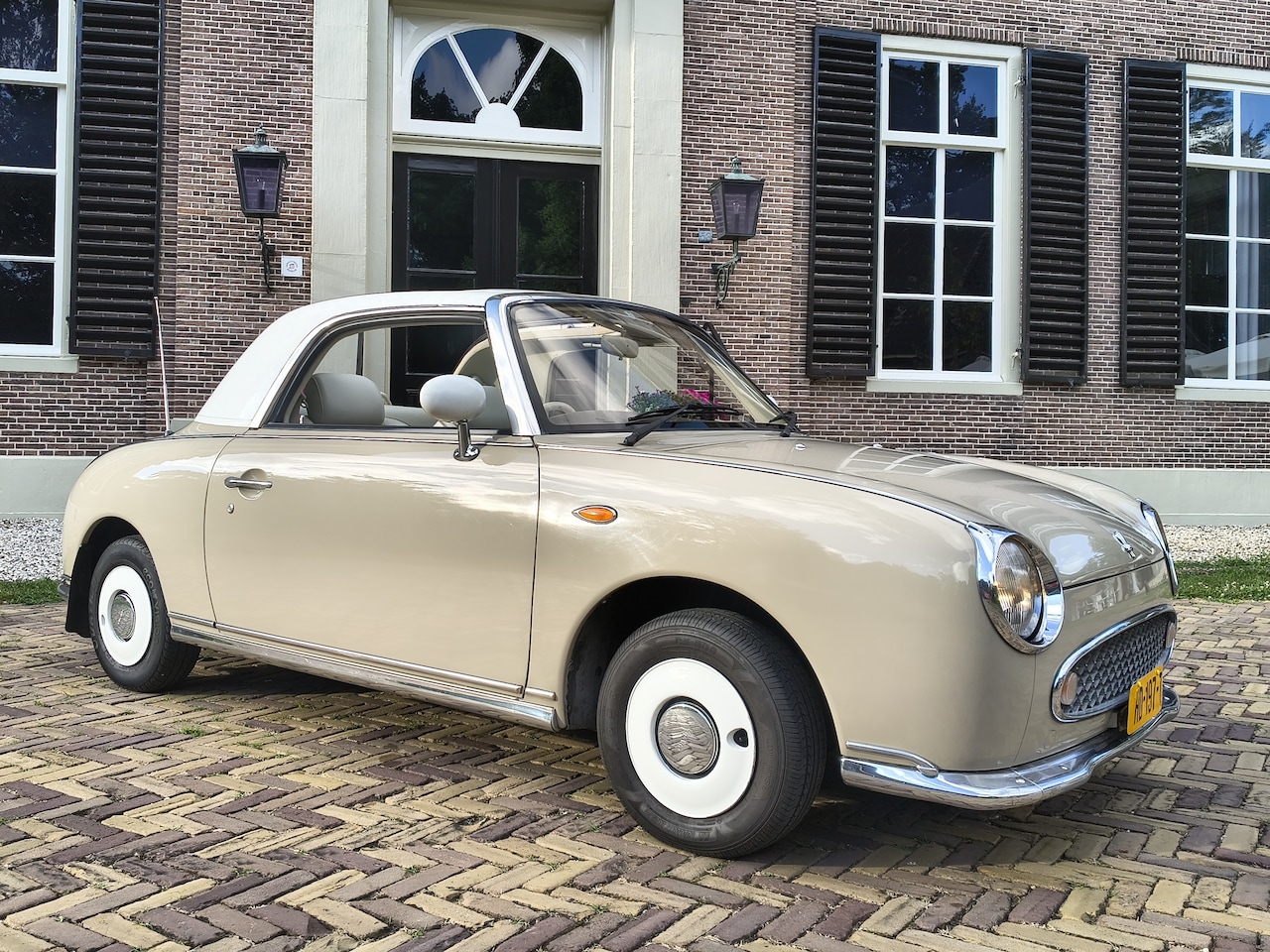 Nissan Figaro - Topaz Mist - AutoWereld.nl