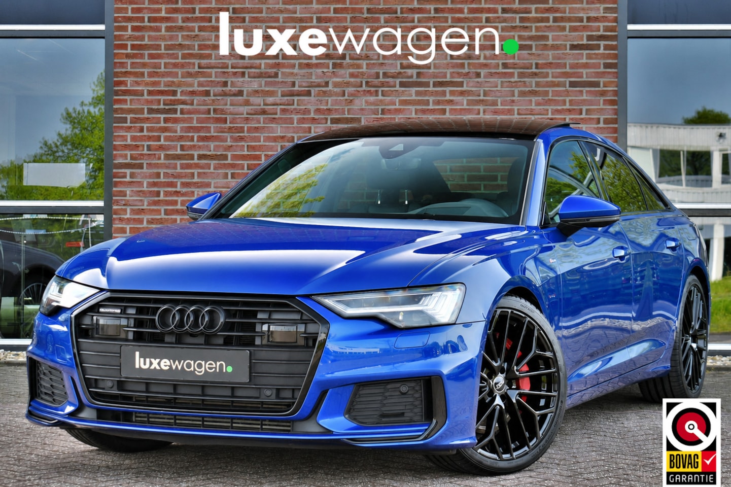 Audi A6 Limousine - 55 TFSI e quattro Competition Pano Ultra-blau HUD ACC B&O - AutoWereld.nl