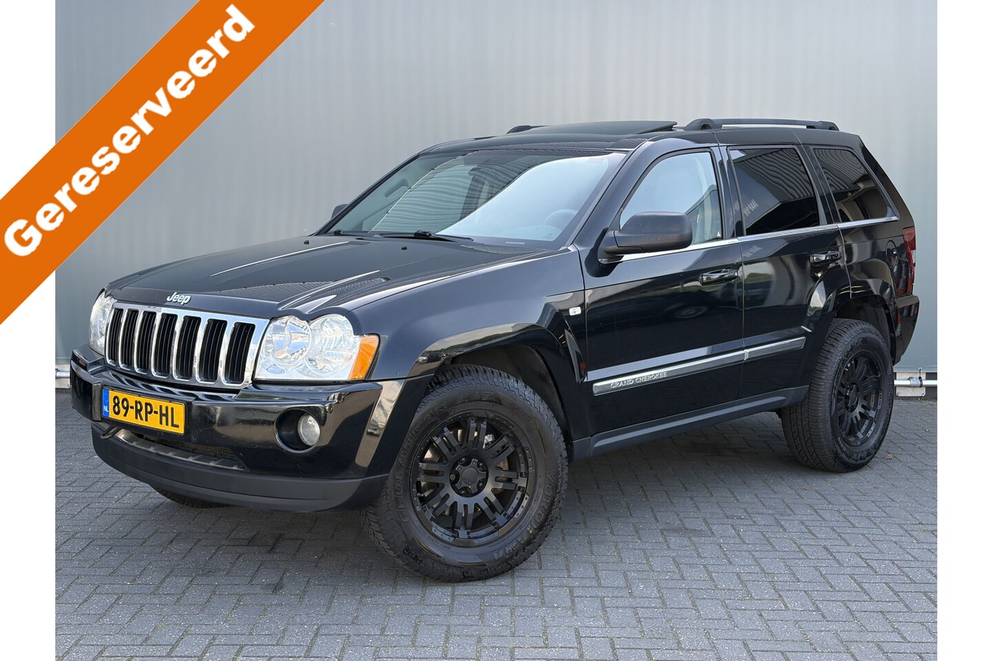 Jeep Grand Cherokee - BJR 2005 5.7 V8 327 PK Hemi Limited YOUNGTIMER! | ALL-TERRAIN | TREKHAAK | SCHUIF-KANTELDA - AutoWereld.nl
