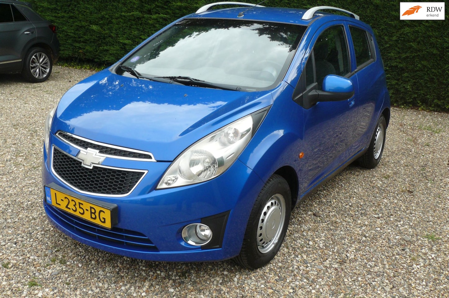 Chevrolet Spark - 1.2 16V LT pitje hagelschade - AutoWereld.nl