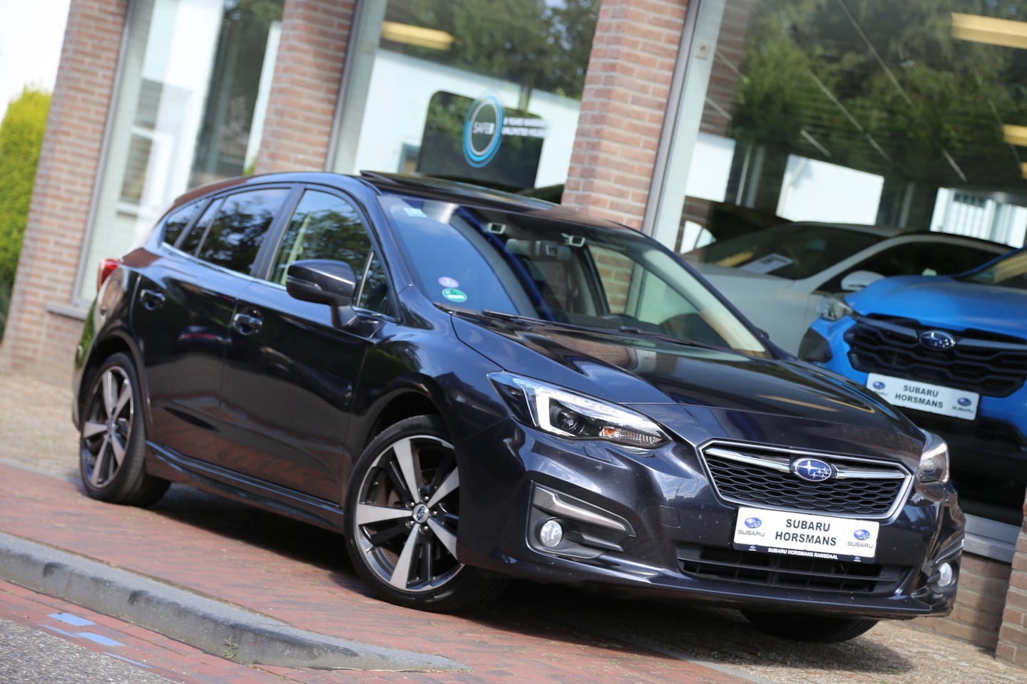 Subaru Impreza - 1.6i 4WD Automaat Premium Leer Schuifdak ACC Navi Camera - AutoWereld.nl