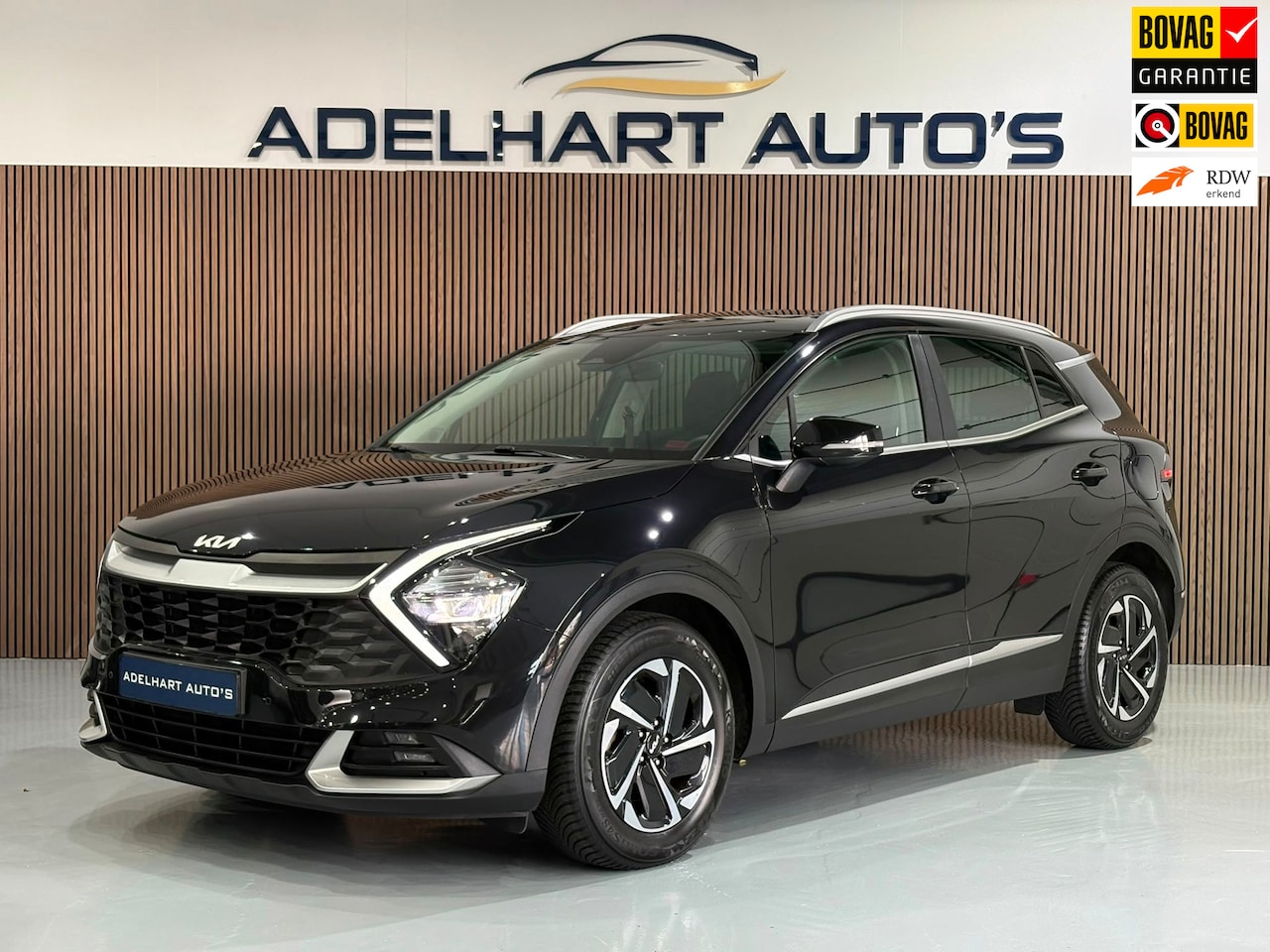 Kia Sportage - 1.6 T-GDi MHEV ComfortLine Automaat / Navigatie full map / Camera / Cruise control / Leder - AutoWereld.nl