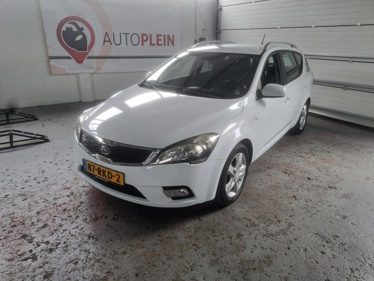 Kia Cee'd Sporty Wagon - 1.4 CVVT Navigator Plus Pack 1.4 CVVT Navigator Plus Pack - AutoWereld.nl