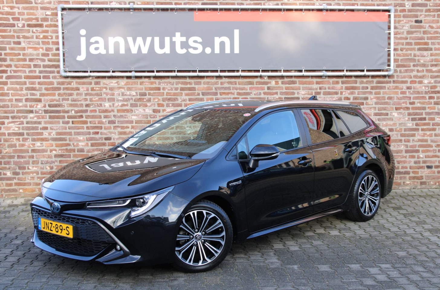 Toyota Corolla Touring Sports - 1.8 Hybrid Style + BSM + PDC + Trekhaak - AutoWereld.nl