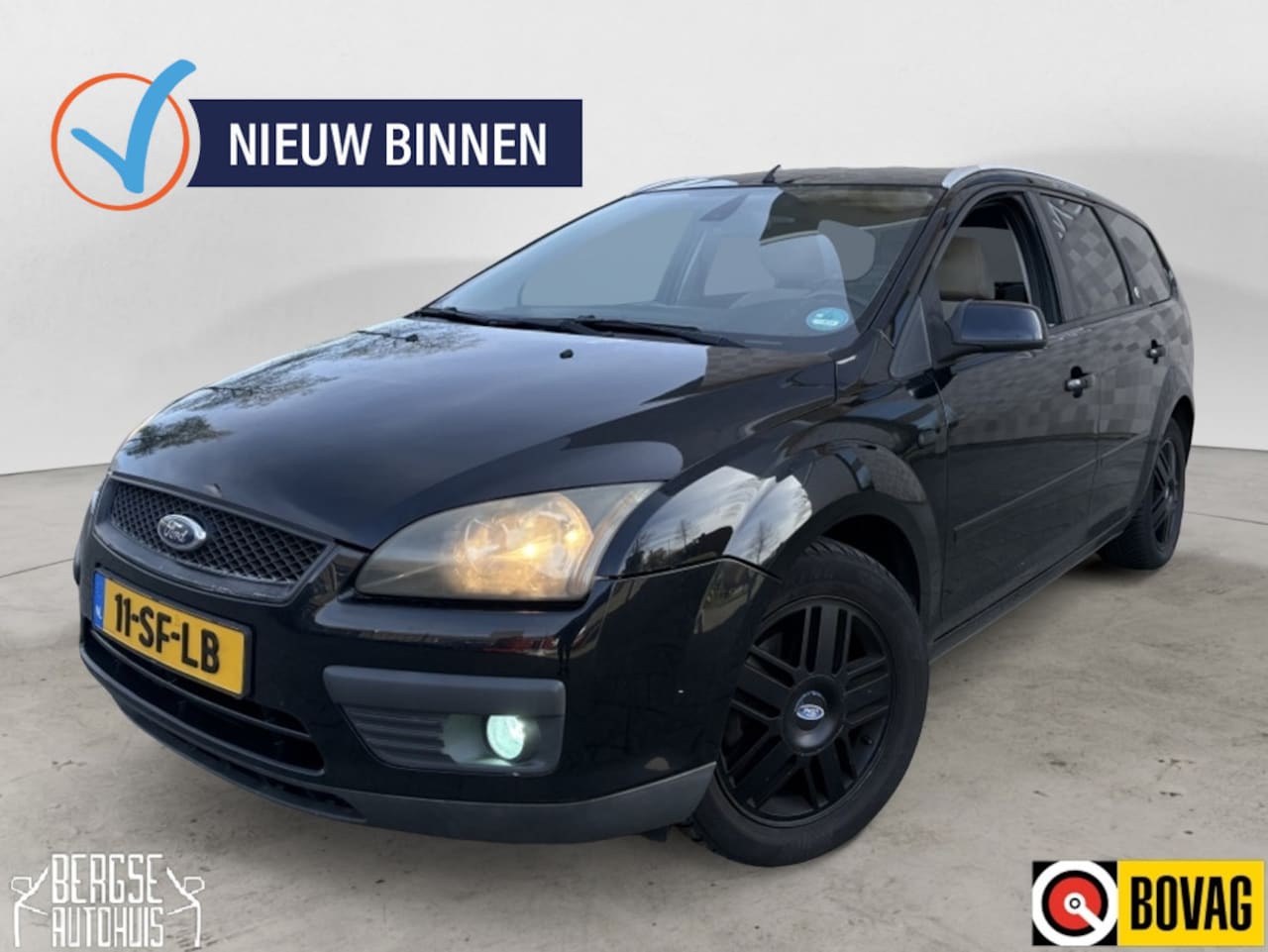 Ford Focus Wagon - 1.6 16V Ghia Ecc Lmv Trekhaak - AutoWereld.nl