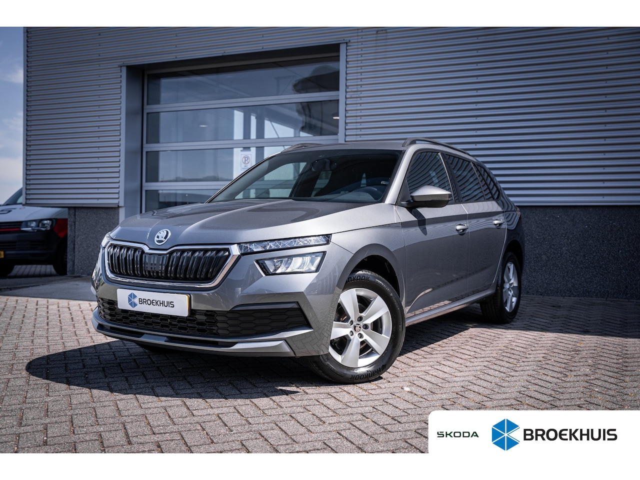 Skoda Kamiq - 1.0 TSI Sport Business | Cruise control adaptief | Electronic climate controle | Trekhaak - AutoWereld.nl