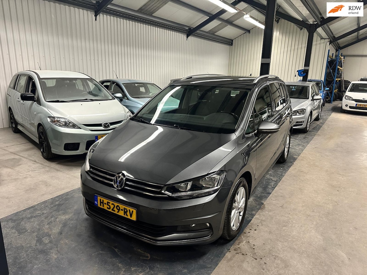 Volkswagen Touran - 1.5 TSI Highline Business R 7p 1.5 TSI Highline Business R 7p - AutoWereld.nl