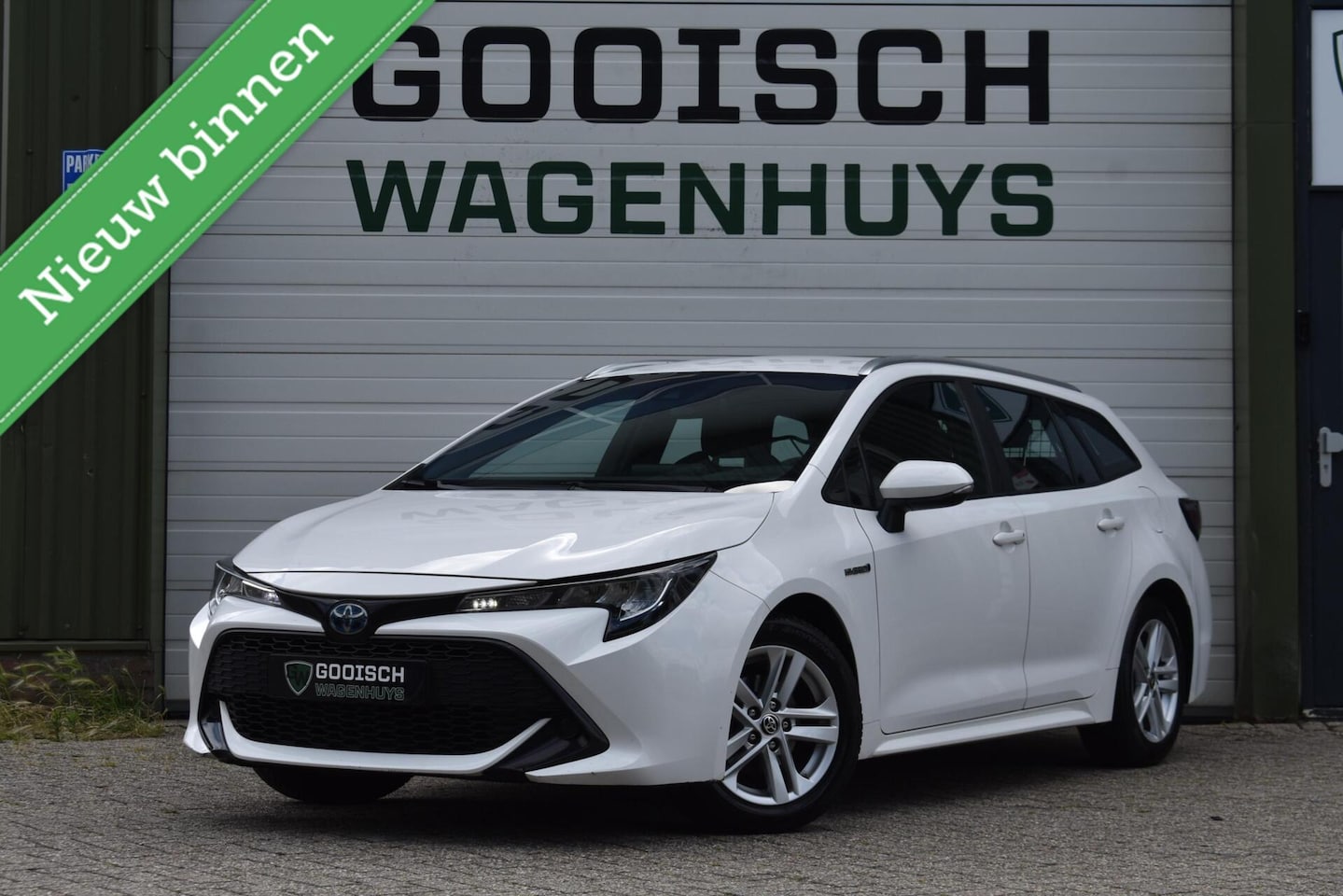 Toyota Corolla Touring Sports - 1.8 Hybrid Active | Trekhaak | Carplay | Camera | - AutoWereld.nl