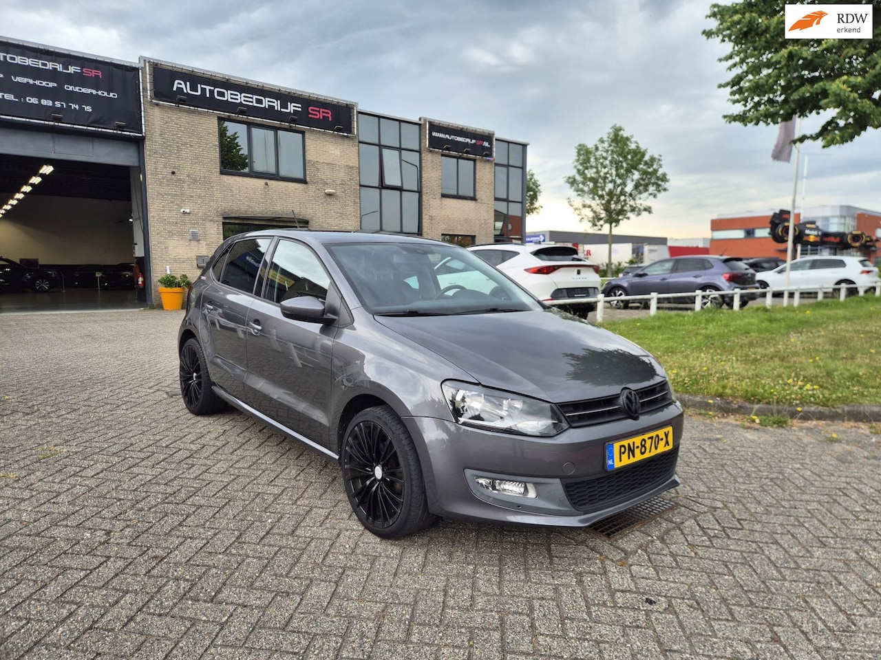 Volkswagen Polo - 1.2 TSI Highline Stoelverwarming! Stuurbekrachtiging! 5 Deurs! Cruise! - AutoWereld.nl