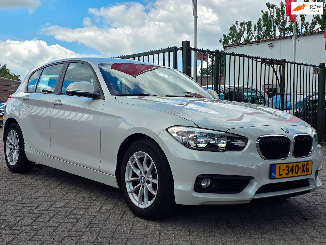 BMW 1-serie - 118i Corporate Lease Executive Paramuur 1e eigenaar dealer onderhouden navigatie airco cru - AutoWereld.nl