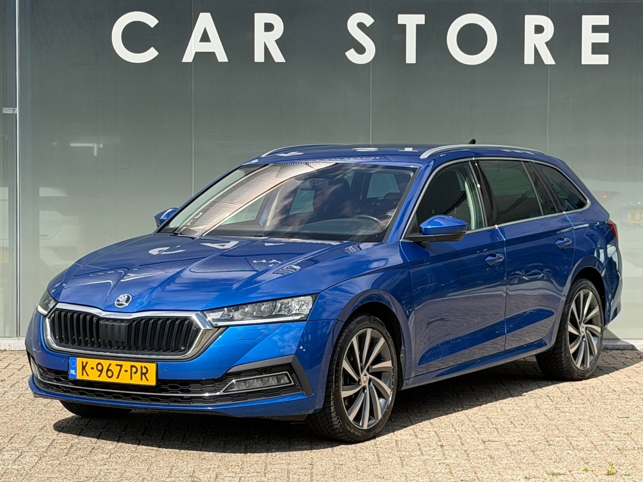Skoda Octavia Combi - 1.0 e-TSI Business Edition Plus TREKHAAK 1E EIGENAAR - AutoWereld.nl