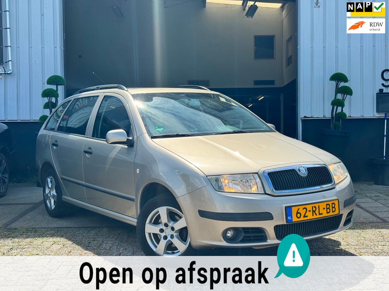 Skoda Fabia Combi - 1.4 | BENZINE | ELEK. RAMEN | AIRCO | CRUISE CONTROL | APK | - AutoWereld.nl
