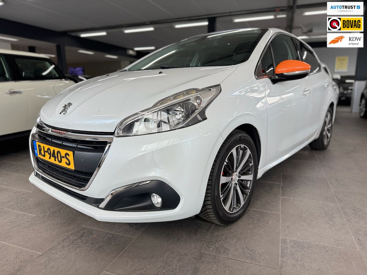 Peugeot 208 - 1.6 BlueHDi Roland Garros GT-line panoramadak Navi camera leer stoelverwarming parkeersens - AutoWereld.nl