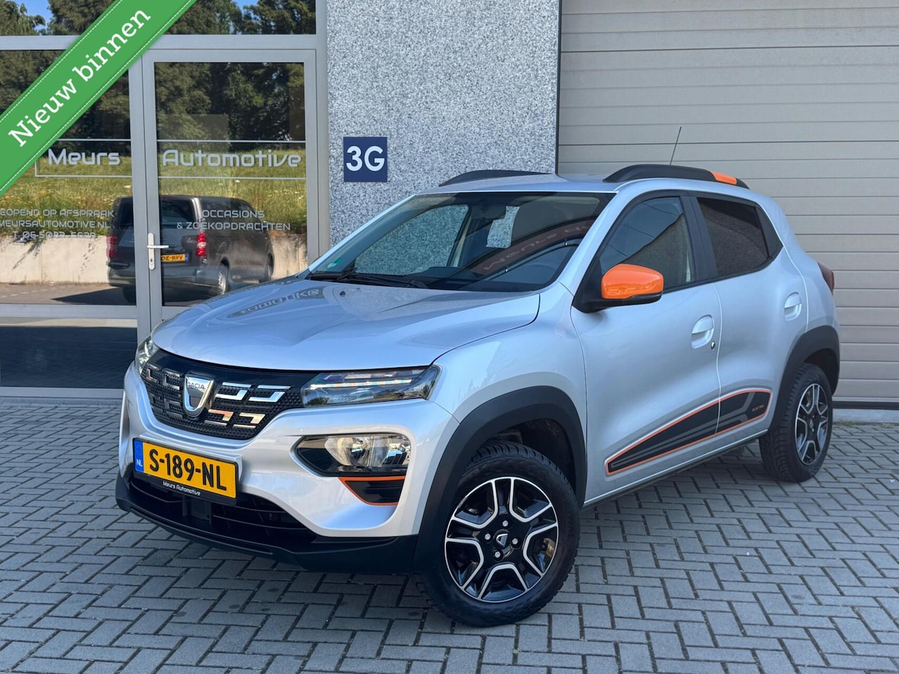 Dacia Spring - Comfort Plus (Orange Pack) 27 kWh DC Lader/Navi/Camera/All season banden/CarPlay - AutoWereld.nl