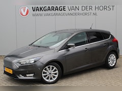 Ford Focus - 1.0-125pk Titanium. Erg nette en luxe Focus. Stoel-, stuur- en voorraamverw., autm. airco