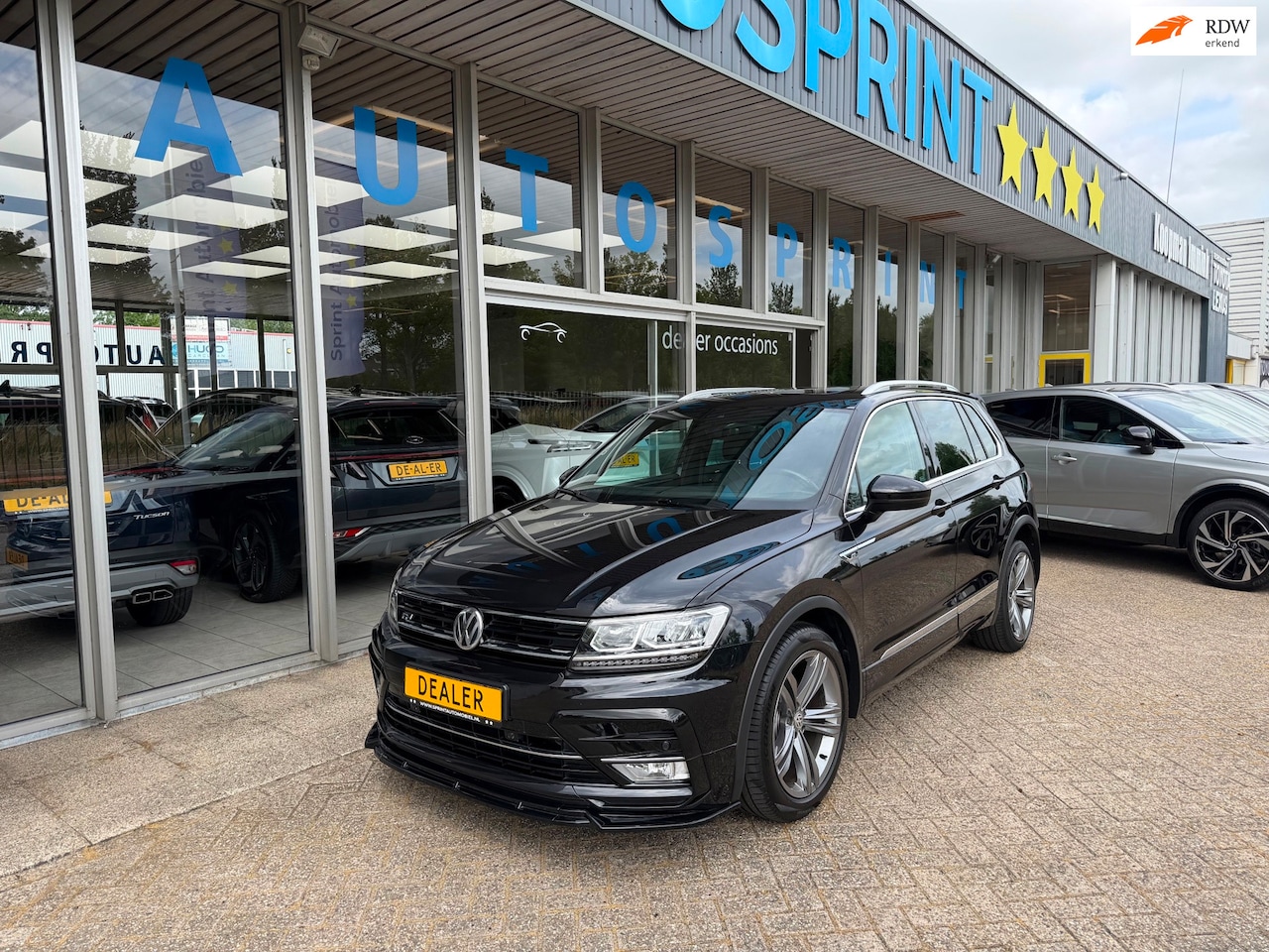 Volkswagen Tiguan - 1.4 TSI ACT R-line PANORAMA , NAVIGATIE - AutoWereld.nl