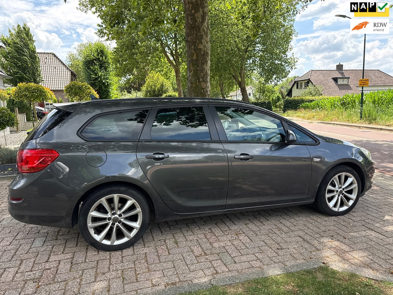 Opel Astra Sports Tourer - 1.4 Turbo Sport 1.4 Turbo Sport - AutoWereld.nl