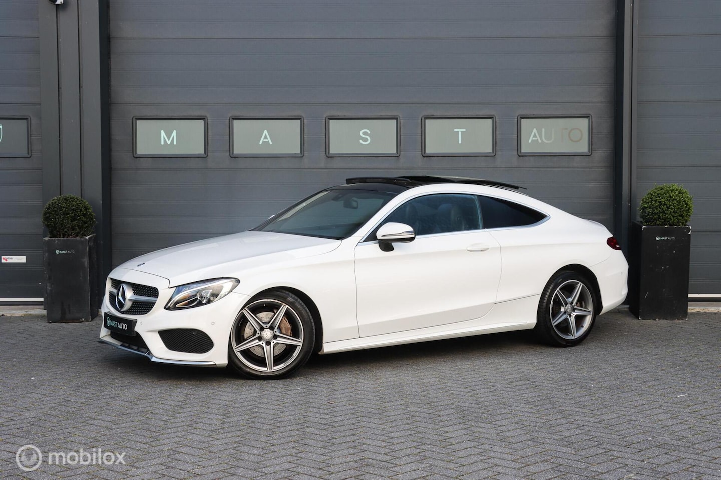Mercedes-Benz C-klasse Coupé - 180|AMG|PANO|Keyless|LED|Stoelverwarming - AutoWereld.nl