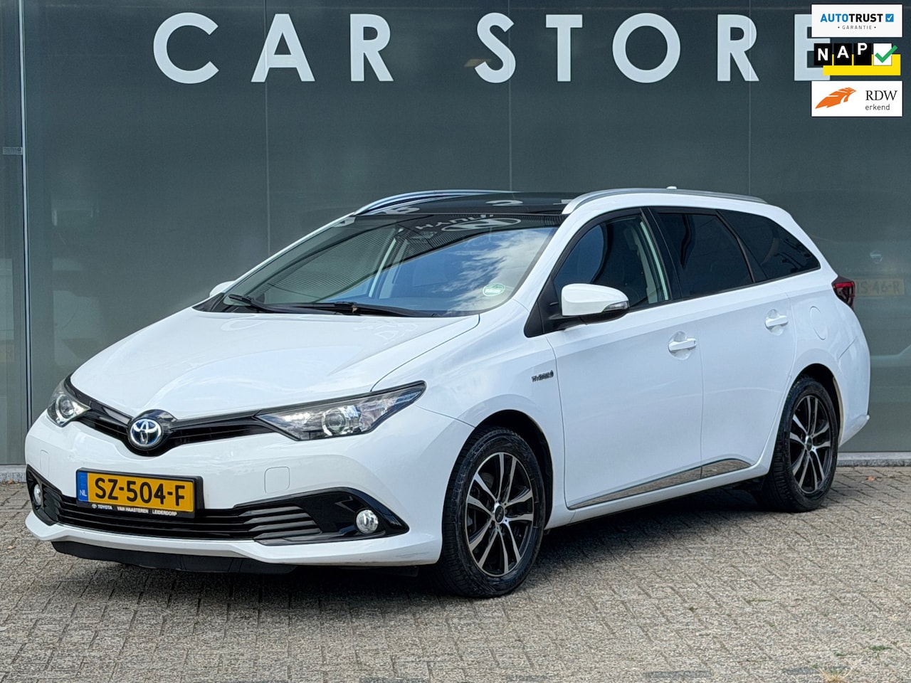 Toyota Auris - 1.8 Hybrid Dynamic Go PAMO/NAVI - AutoWereld.nl