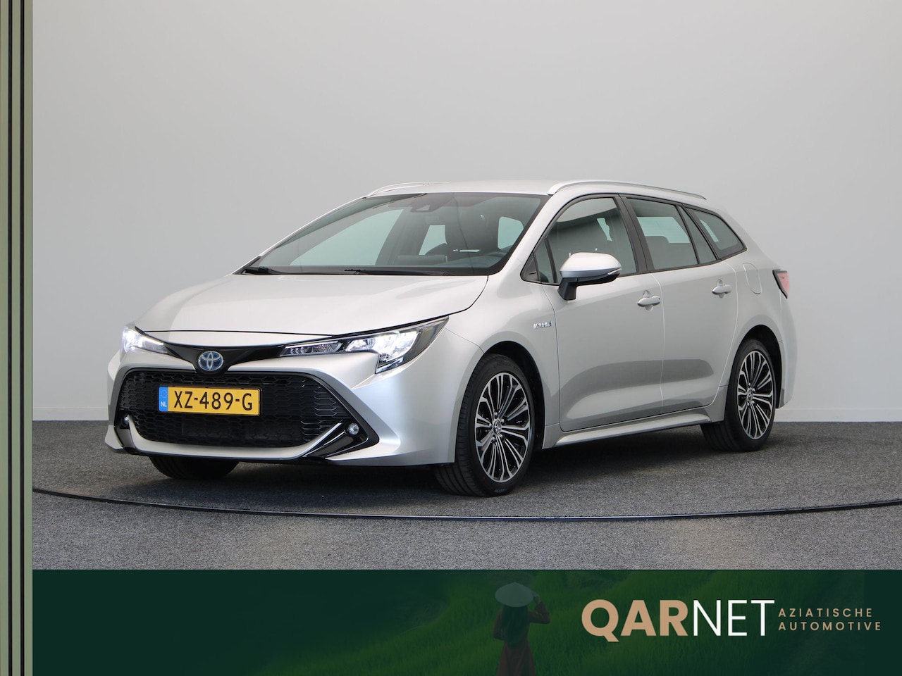Toyota Corolla Touring Sports - 1.8 Hybrid First Edition | Stoelverwarming | DAB Audio | Cruise Control Adaptief | Trekhaa - AutoWereld.nl
