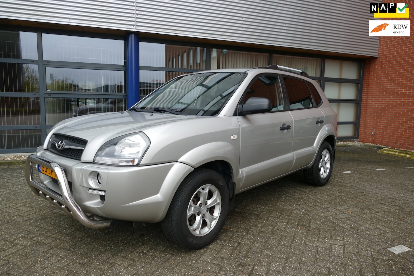 Hyundai Tucson - 2.0i Dynamic Executive Airco Apk 08-06-2027 - AutoWereld.nl