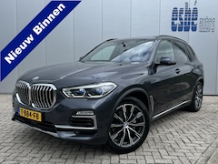 BMW X5 - xDrive30d High Executive X-Line Luchtvering Individual Tartufo leder Trekhaak 3500 kg Pano