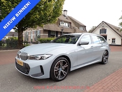 BMW 3-serie Touring - 320e / TREKHAAK / FACELIFT WIDESCREEN / CARPLAY / SPORTSTOELEN