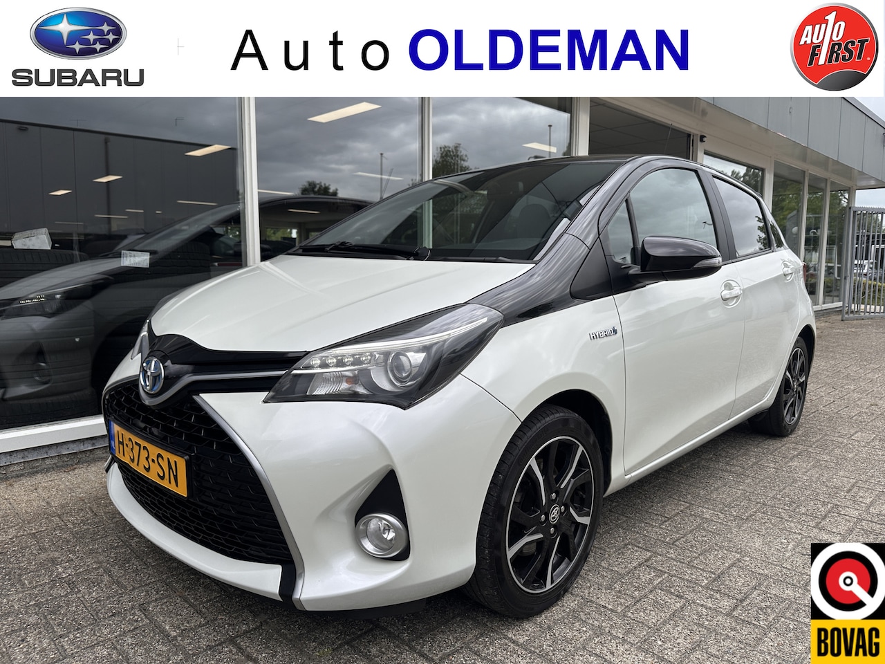 Toyota Yaris - 1.5 Hybrid Dynamic Bi-Tone NAVI,CLIMA,STOELVERWARMING - AutoWereld.nl