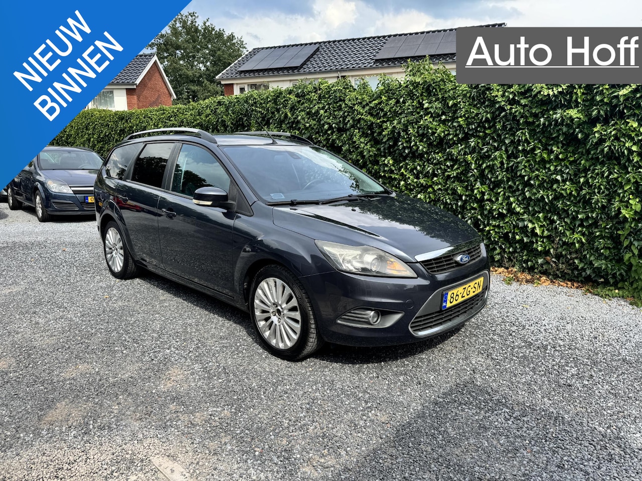 Ford Focus Wagon - 1.6 Titanium | Navi | Autom. Airco | Cruise Control | LMV | Privacy Glass | PDC | Trekhaak - AutoWereld.nl