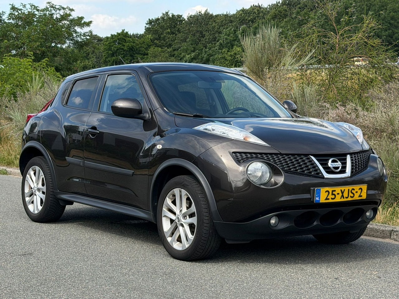 Nissan Juke - 1.6 Acenta NWE APK / AIRCO / NAVI / CAMERA / PDC / TREKHAAK / CRUISE / - AutoWereld.nl