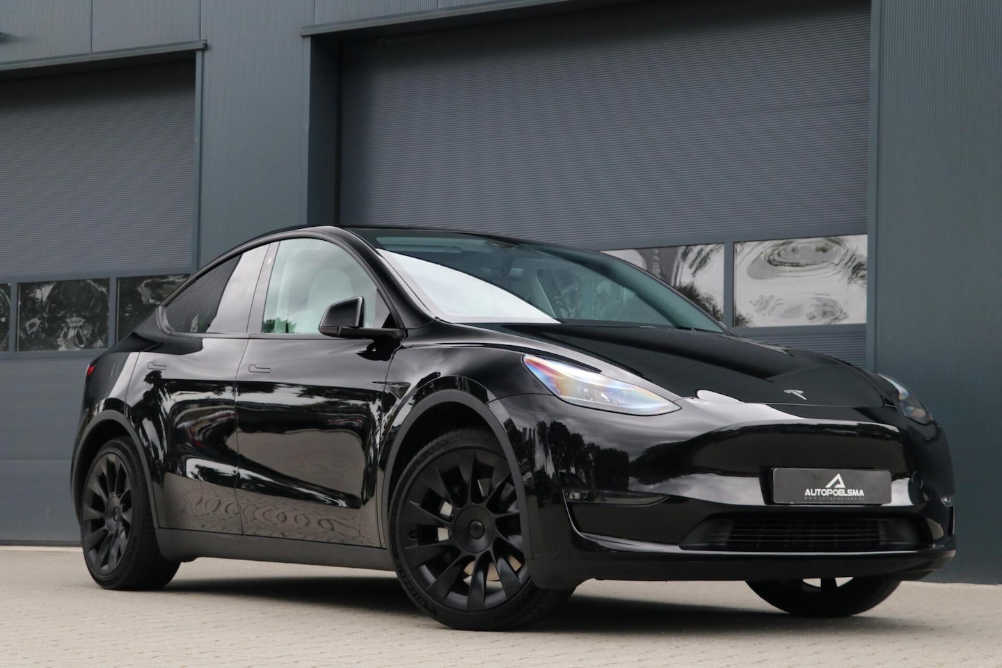 Tesla Model Y - Long Range AWD 75 kWh FSD Trekhaak Panodak 360View Premium interieur DualMotor Stoelverwar - AutoWereld.nl