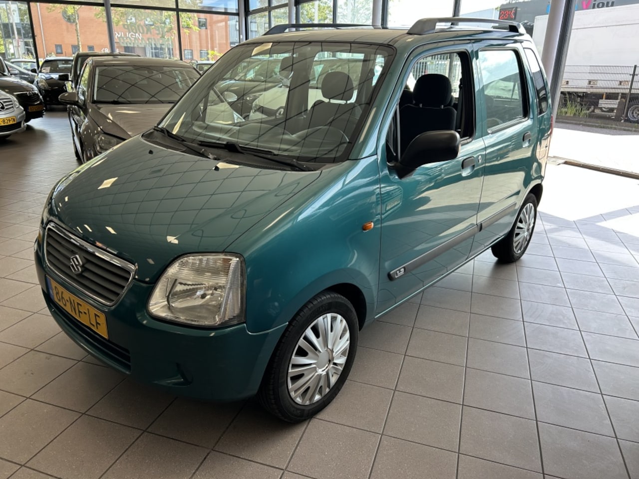 Suzuki Wagon R+ - 1.3 GLS AUTOMAAT AIRCO APK 3-27 BJ 2003 !!! - AutoWereld.nl