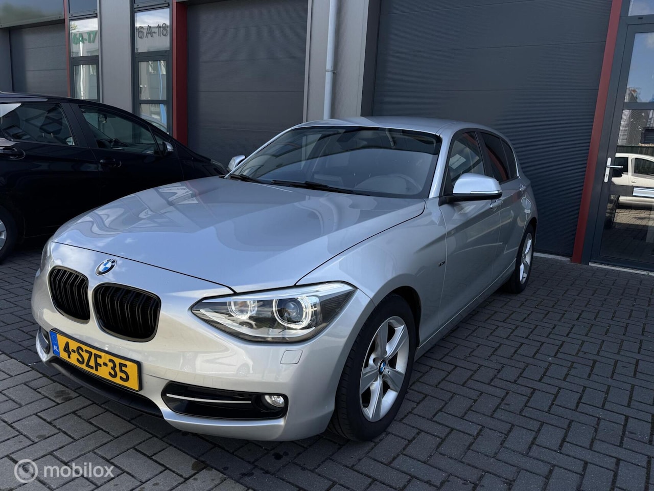 BMW 1-serie - 114i EDE Executive 114i EDE Executive, 6-bak, NAP,Angle Eye,Climate - AutoWereld.nl