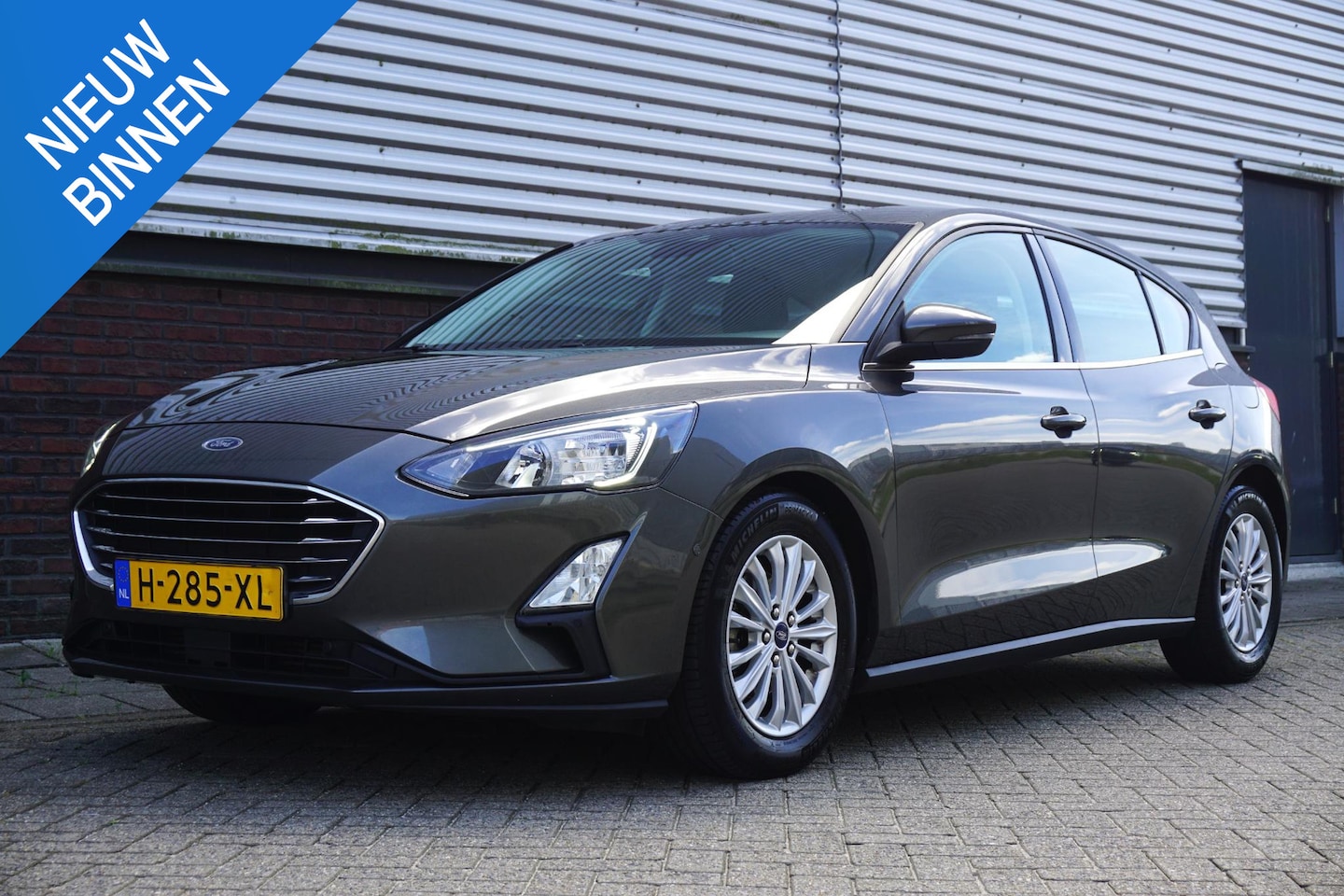 Ford Focus - 1.0 EcoB.125PK Titanium Bus/Inparkeer hulpsysteem/ 100%Dealeronderhouden. - AutoWereld.nl