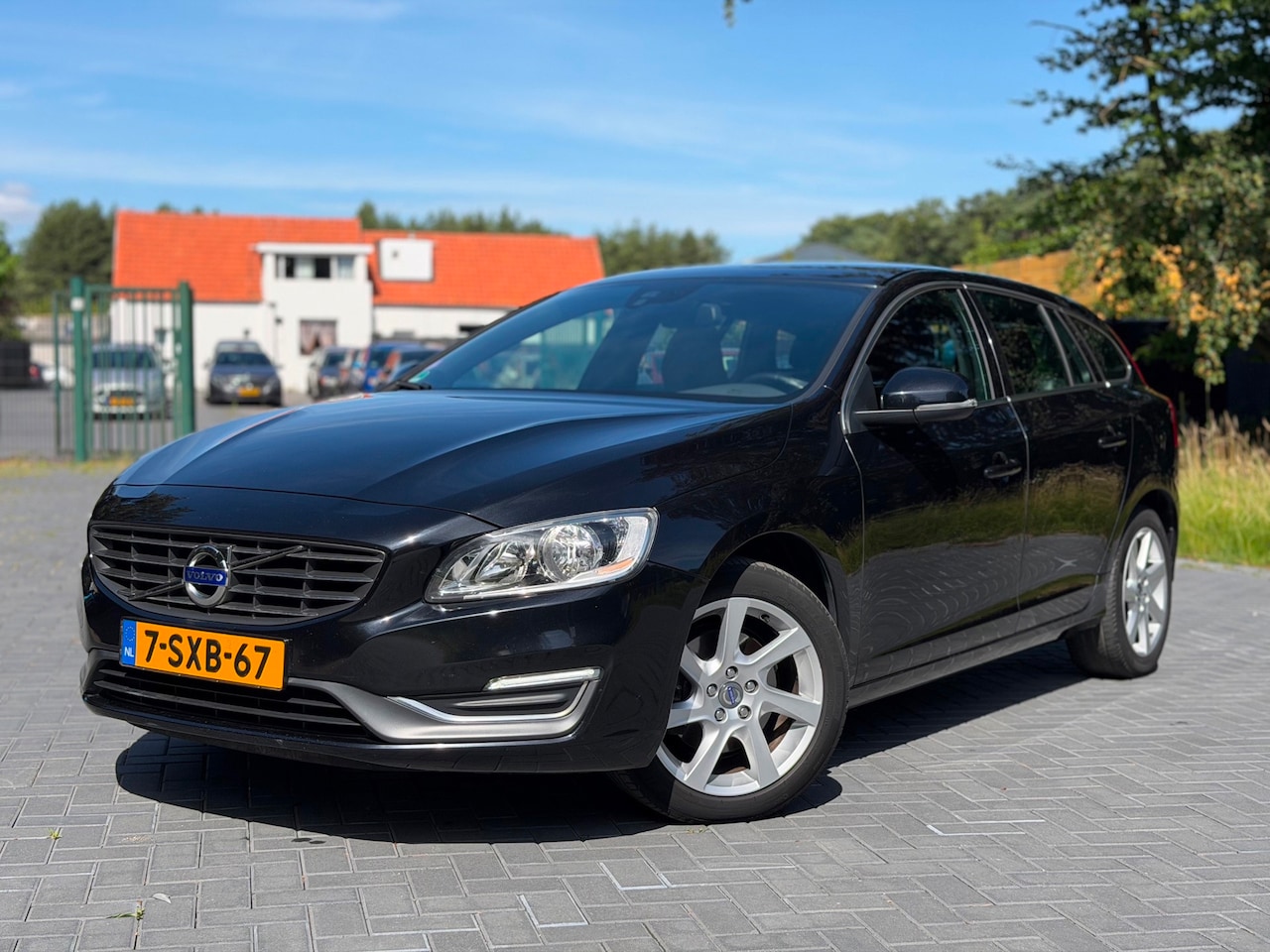 Volvo V60 - 1.6 T4 Summum/Airco/Cruise/Leer/LMV/Elekt Raam - AutoWereld.nl