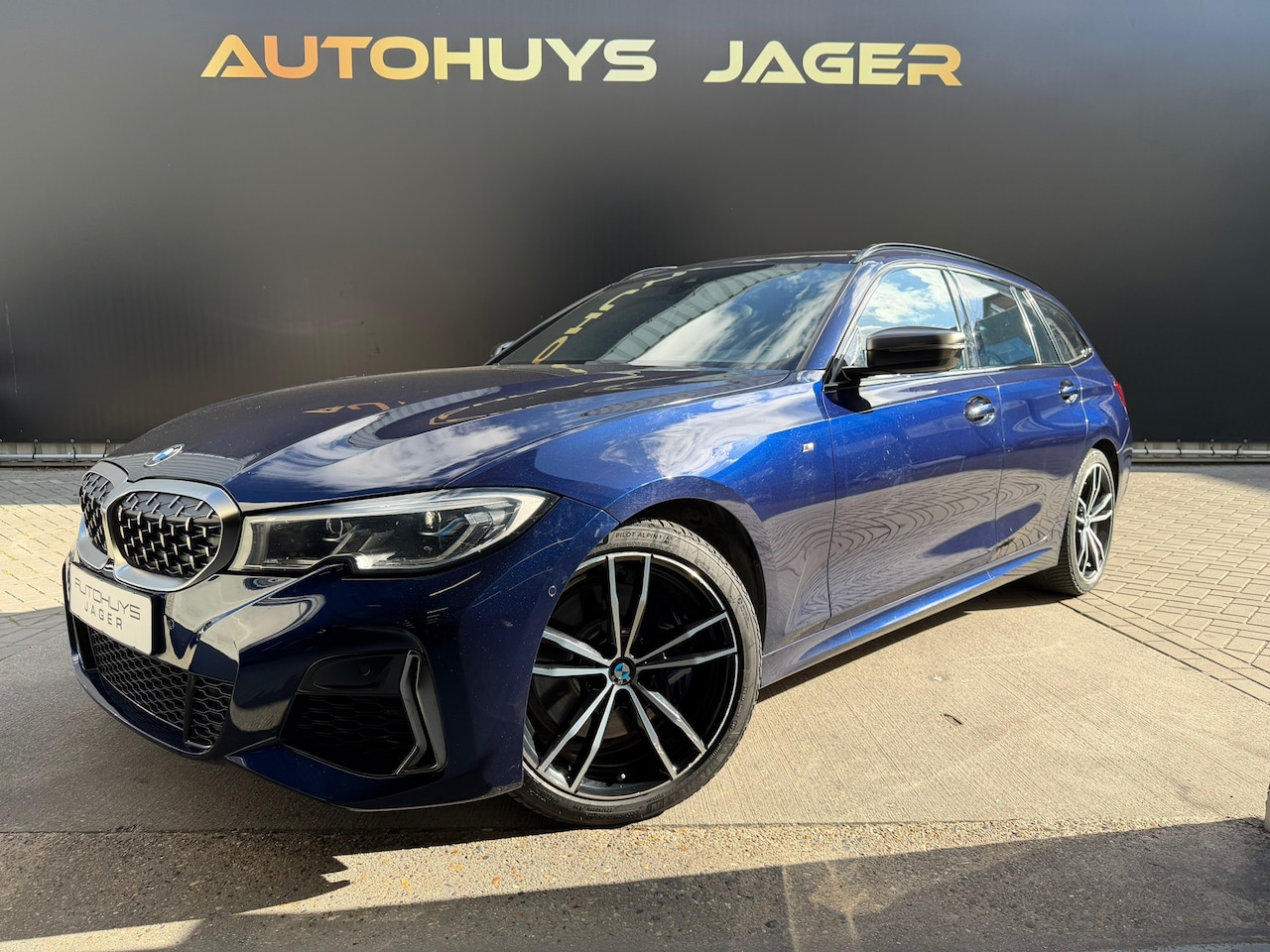 BMW 3-serie Touring - M340i xDrive Pano Laser Leder Carplay Virtual Memory Hifi Navi - AutoWereld.nl