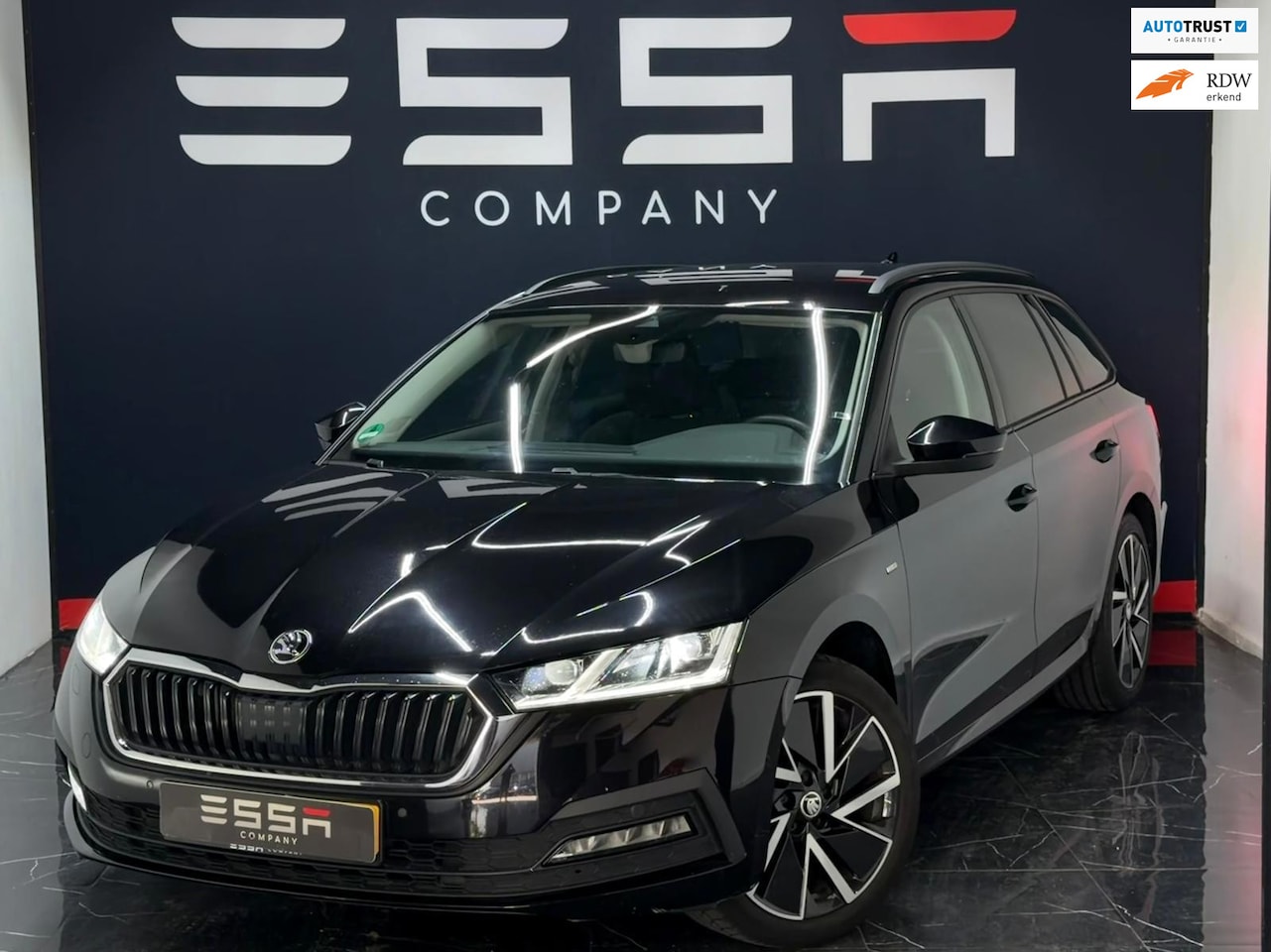 Skoda Octavia Combi - 1.5 e-TSI Business KeylessGo Carplay LED Sfeerverlichting - AutoWereld.nl