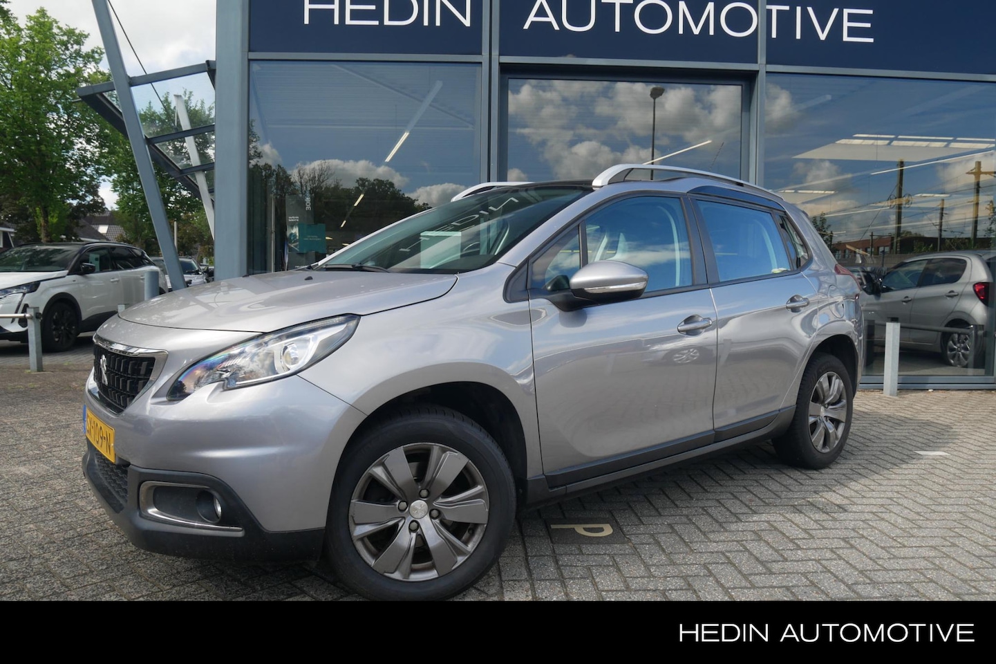 Peugeot 2008 - 1.2 Blue Lion | Navigatie | Apple Carplay/Android Auto | Airco | Elek. Ramen | Cruise Cont - AutoWereld.nl
