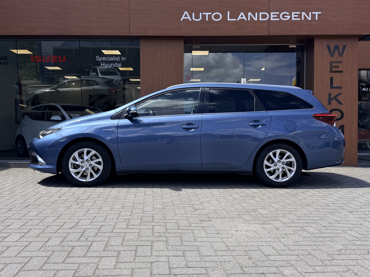 Toyota Auris Touring Sports - 1.8 Hybrid Lease Pro 1.8 Hybrid Lease pro - AutoWereld.nl