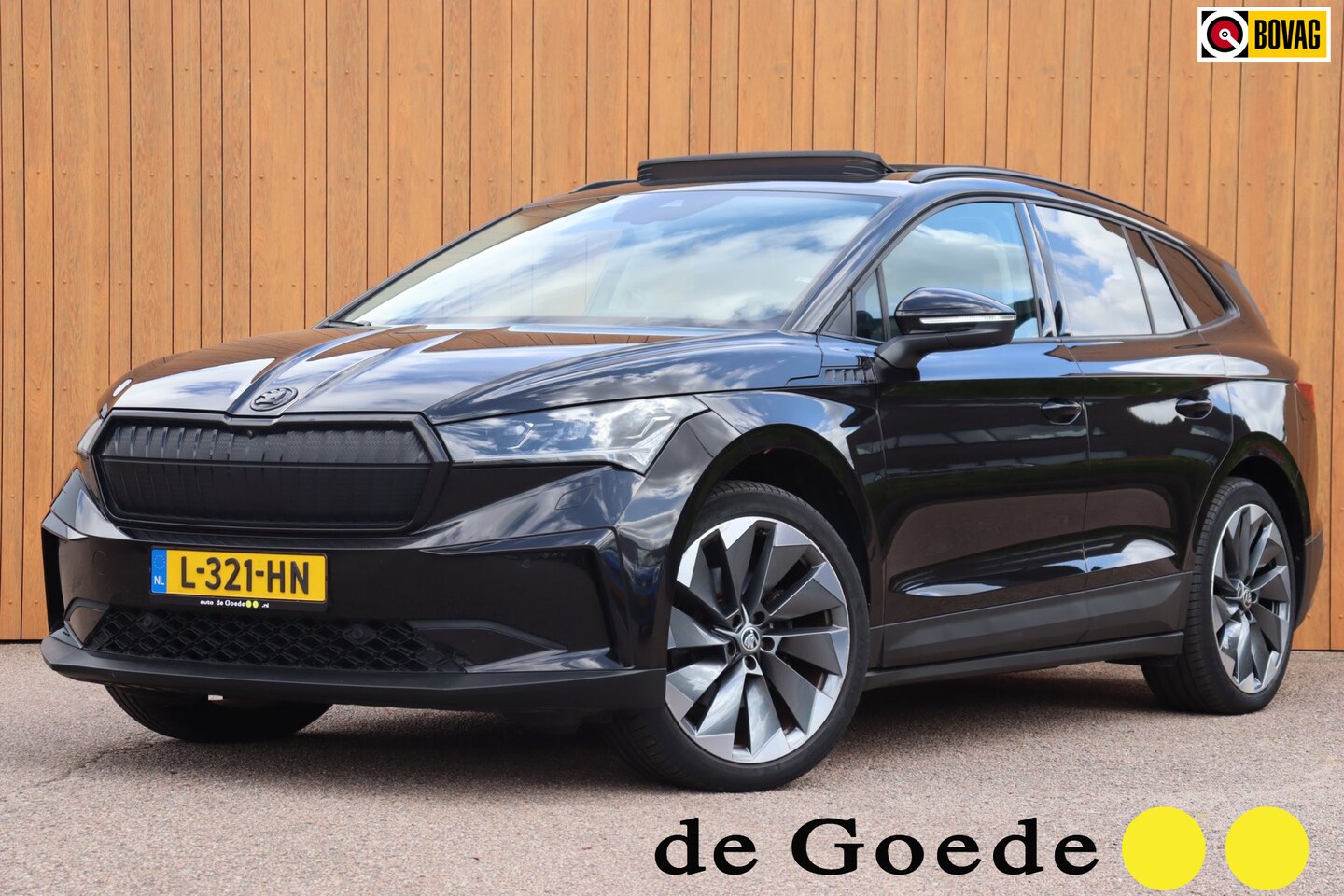 Skoda Enyaq iV - 60 Sportline schuifdak el.trekhaak camera's leer+mem+vw org.NL 93,53% travel assist - AutoWereld.nl